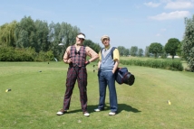 Golfer en Caddy