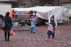 Fluitende bouwvaksters op de Tilburgse markt